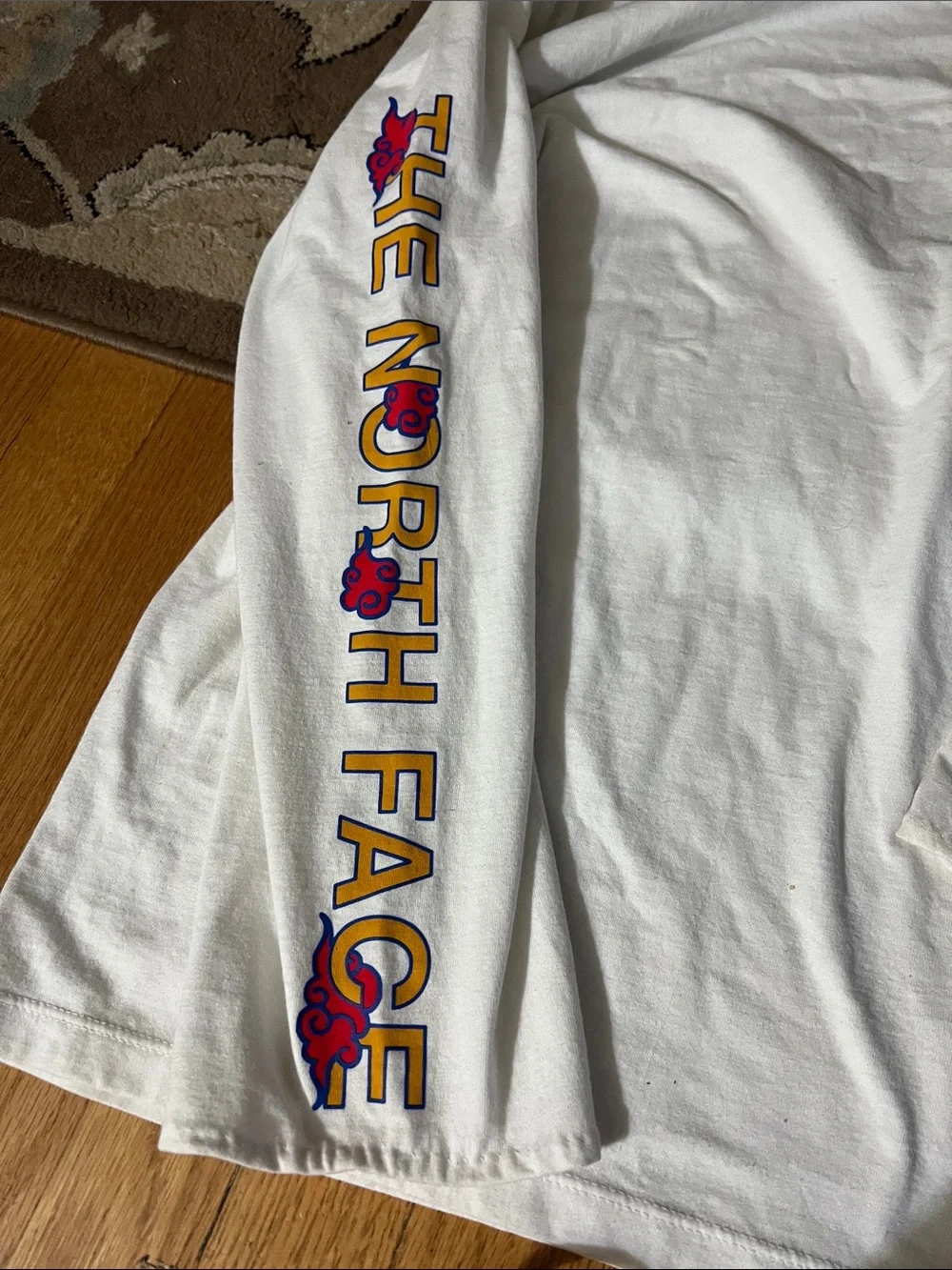 The North Face White Tee with Red & Blue Tiger Graphic